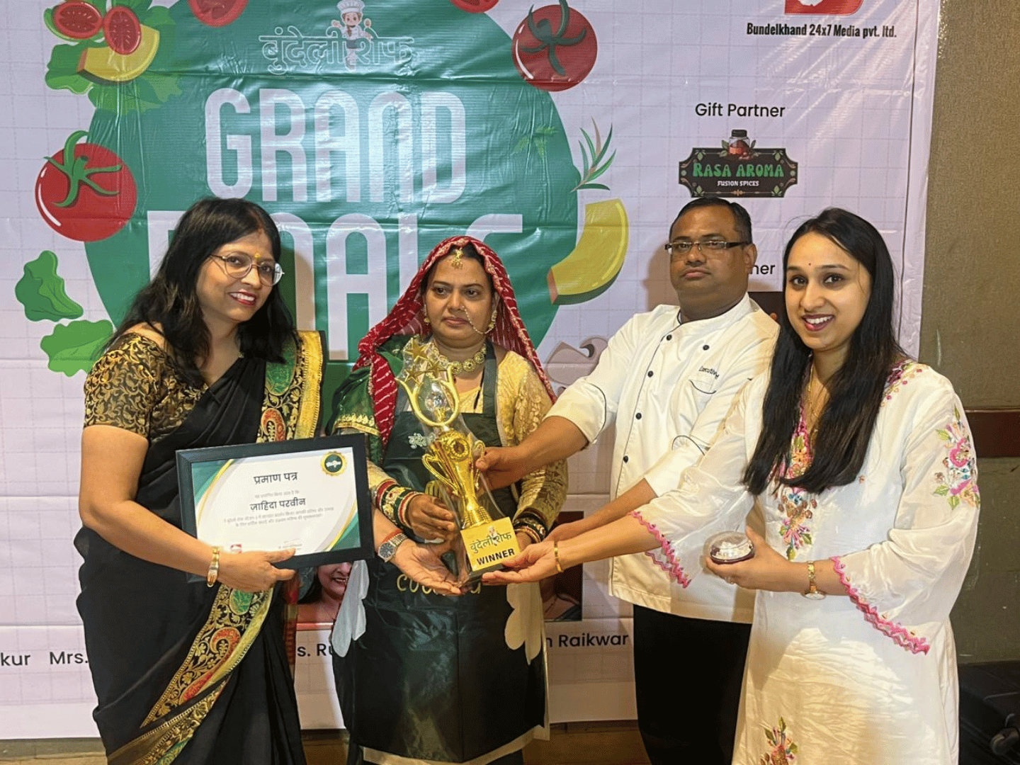 Bundeli Chef grand finale winner receiving trophy and certificate