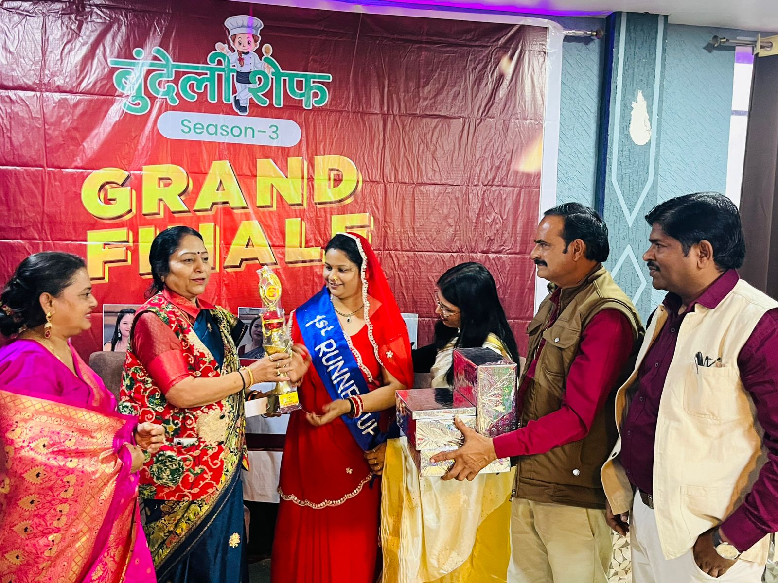 Runner up receiving trophy at Bundeli Chef Season 3 grand finale